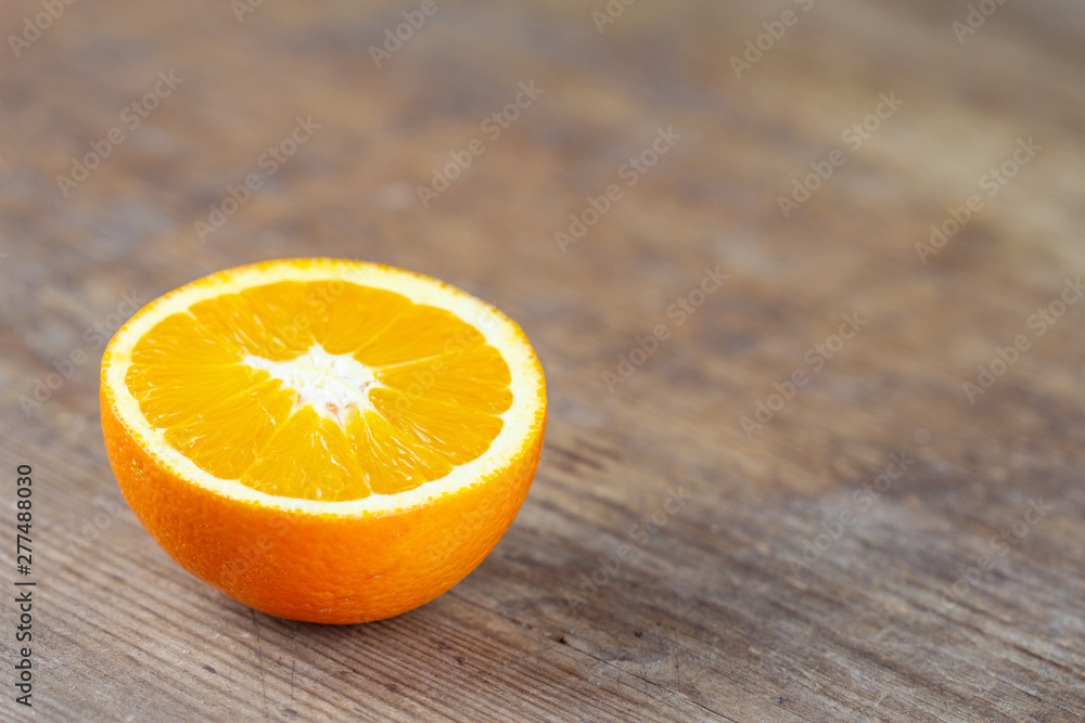 orange fruit isolated on a wooden board copy space orange fruit isolated on a wooden board copy space