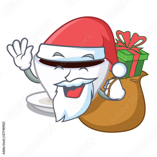 Santa with gift character latte macchiato in the fridge