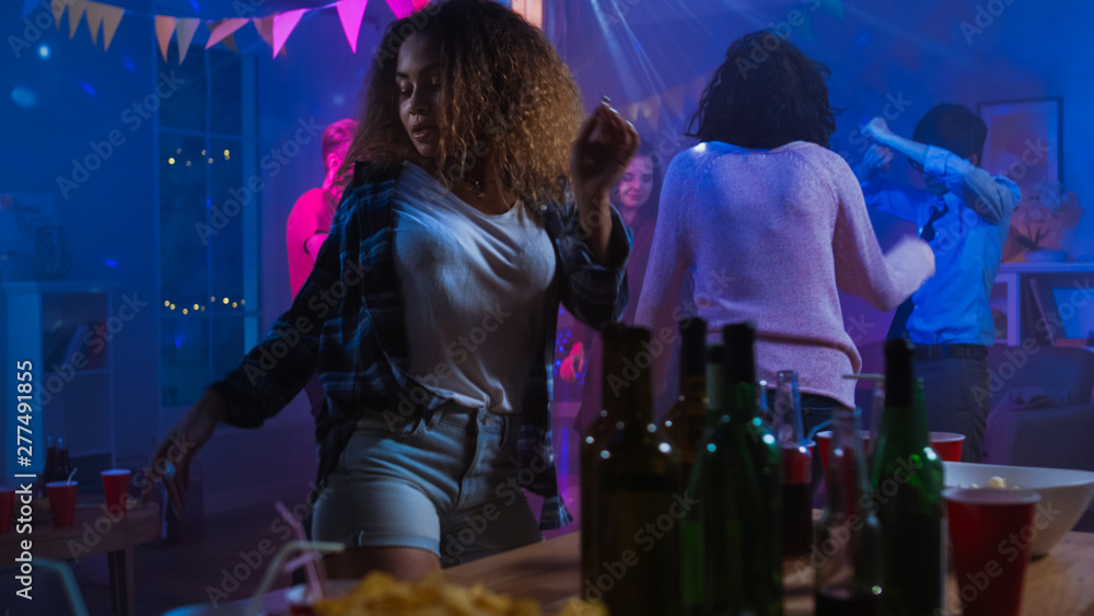 At the Wild House Party: Beautiful Black Girl Seductively Dances in Neon  Lights. In the Background Other People Having Fun, Clubbing. Stock Photo |  Adobe Stock