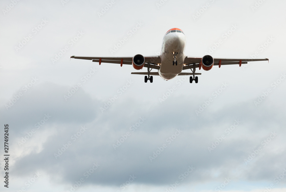 modern passenger plane lands at airport