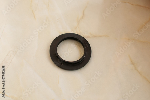 Black macro reverse ring for camera lens