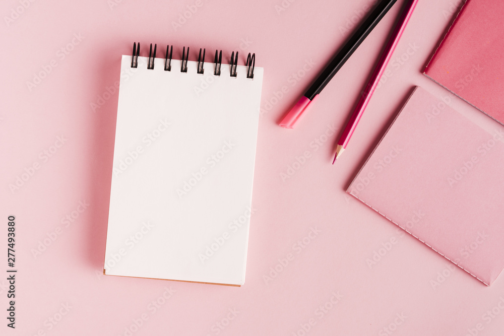 Pink office tools colored surface Pink office tools colored surface