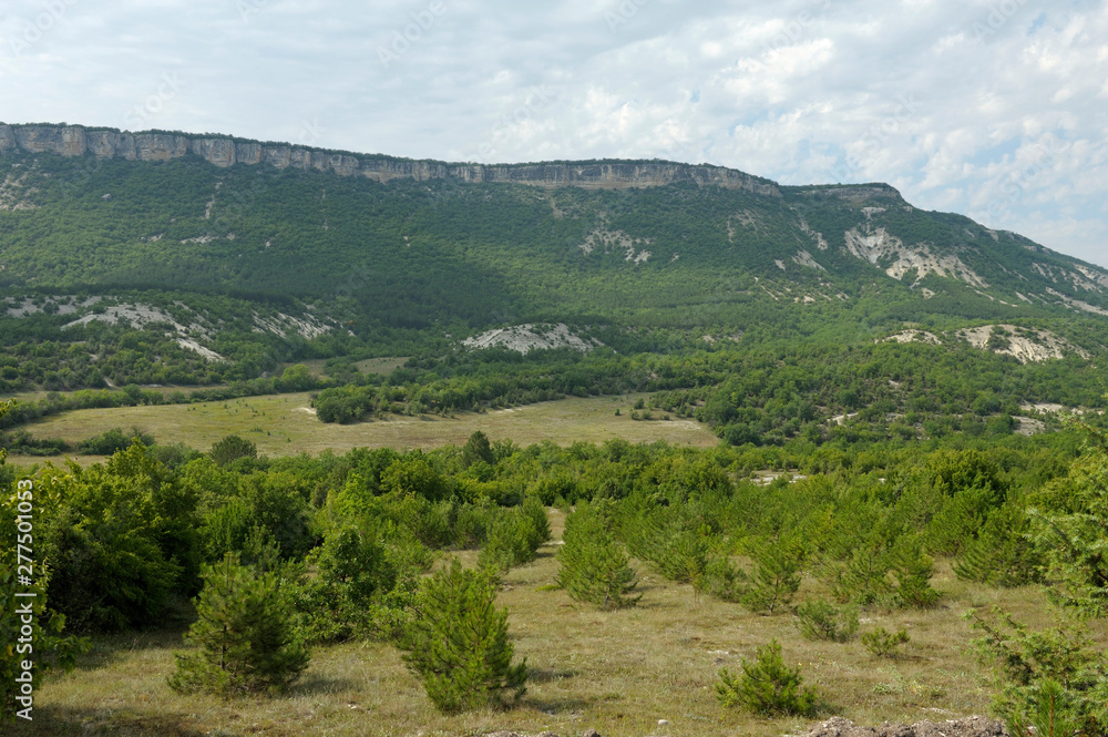 View of mountains hills, trees and bushes. Vysokoe (Kermenchik) village, Crimea,Ukraine