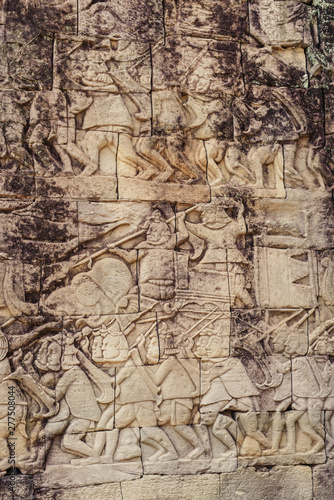 Ancient Khmer carving bas-relief. Wall of Bayon Temple  Angkor Thom  Siem Reap  Cambodia