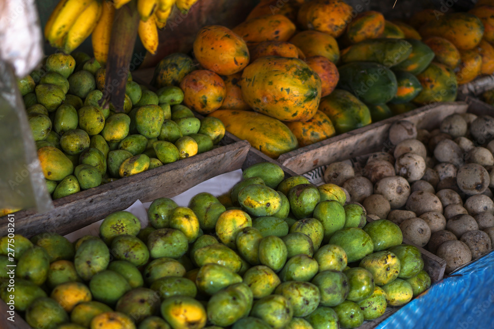 Traditional market in Asia with a variety of fruits and vegetables from farms and jungles. Sales business background in Sri Lanka. Stock photo Traditional market in Asia with a variety of fruits and vegetables from farms and jungles. Sales business background in Sri Lanka. Stock photo