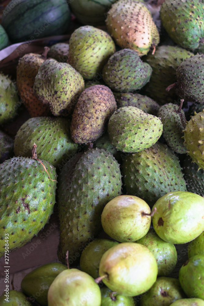 Jackfruit on the market in asian nature. Vegetarian temma for background. Stock photo Jackfruit on the market in asian nature. Vegetarian temma for background. Stock photo