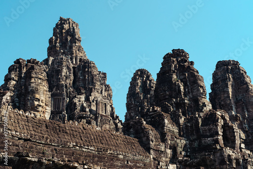 Faces of Bayon temple in Angkor Thom, Siemreap, Cambodia. The Prasat Bayon is a richly decorated Khmer temple at Angkor , ancient architecture in Cambodia © ANR Production