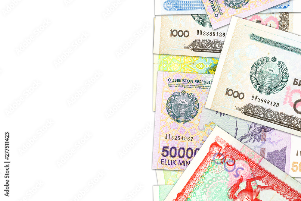 some Uzbek Som banknotes indicating growing economy with copyspace