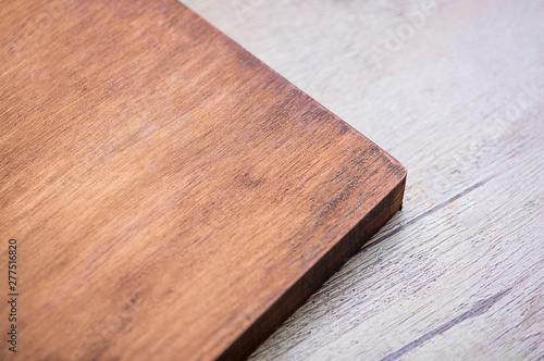 Cutting board for the kitchen on wooden table.