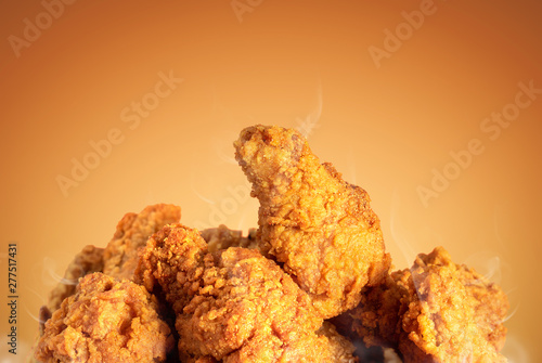 Vászonkép Fried chicken or crispy kentucky on brown background