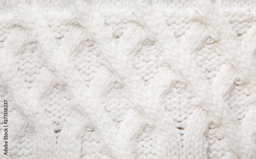 White cable knitting fabric textured background White cable knitting fabric textured background