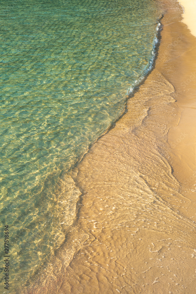 Background Image of Turquoise Sea on Golden Sand Viewed from Above