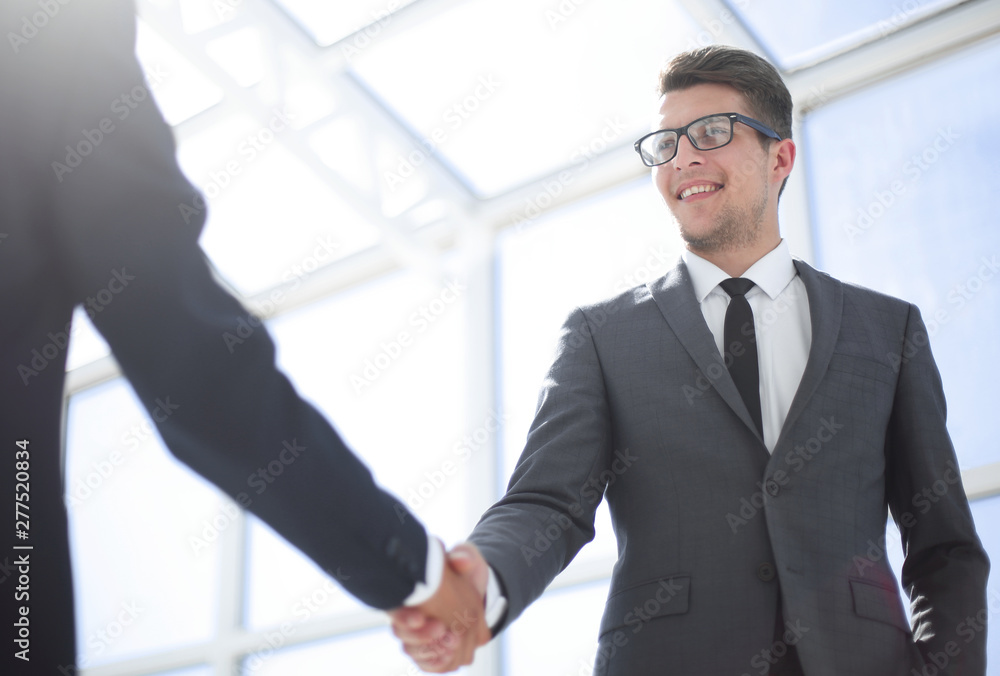 handshake of business partners .bottom view