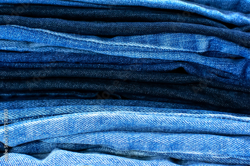 Set of different blue jeans. Detail of nice blue jeans. Jeans texture or denim background. Blue denim jeans texture, fabric grunge background. Beauty and fashion, clothing concept