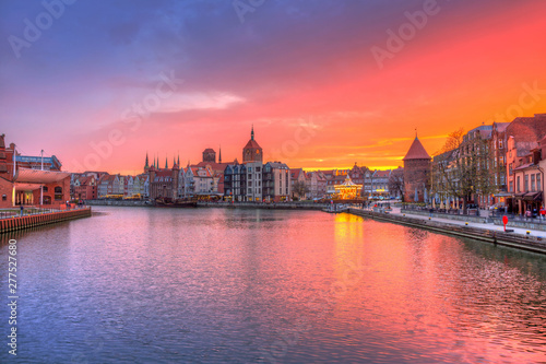Amazing sunset in Gdansk reflected in Motlawa river, Poland.