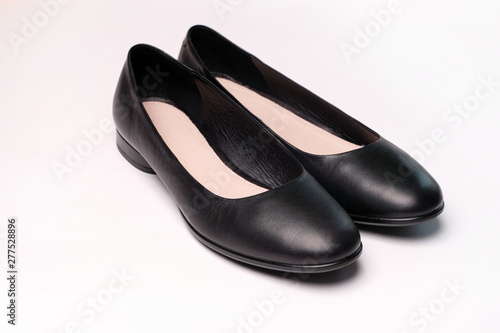 Female black leather ballet shoes