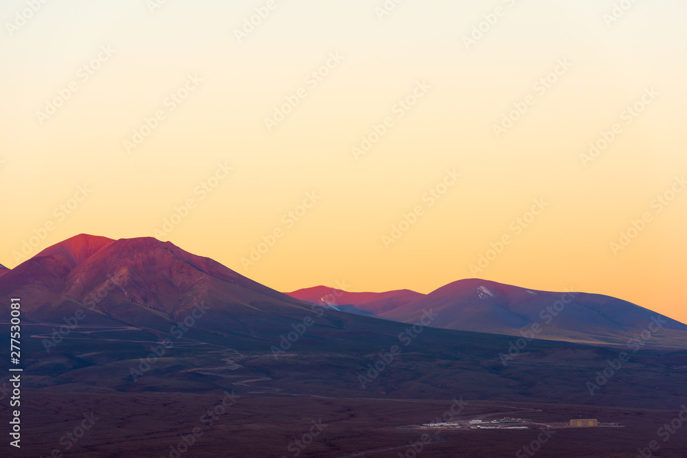 ALMA, atacama large millimeter array, base Camp seen from the distance in the altiplano, Atacama Desert, Chile ALMA, atacama large millimeter array, base Camp seen from the distance in the altiplano, Atacama Desert, Chile