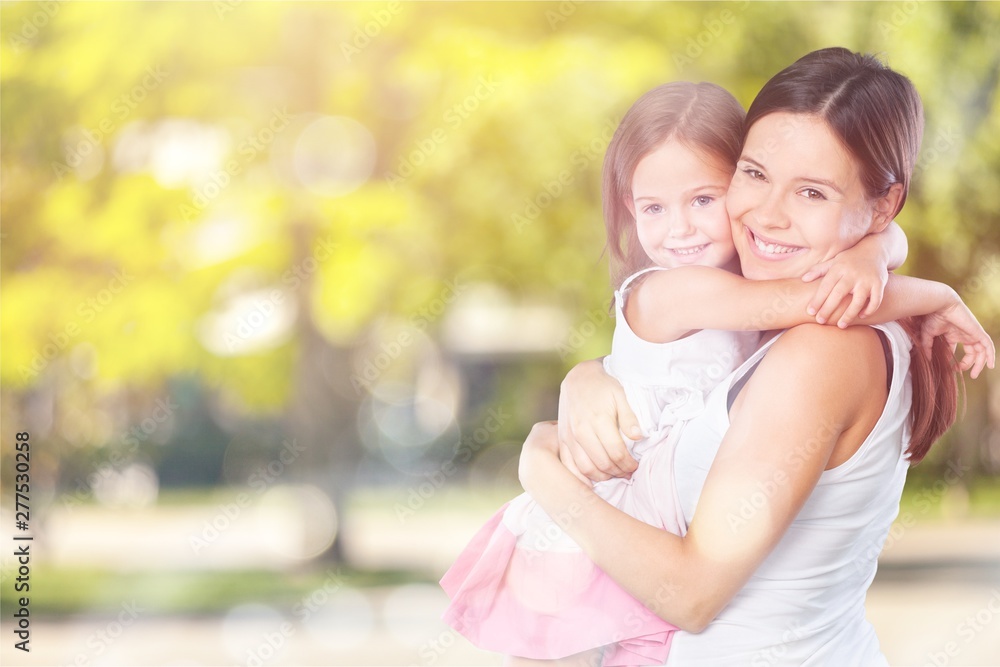 Happy Mother and daughter hugging Happy Mother and daughter hugging