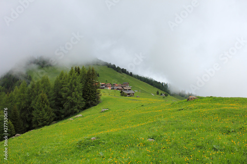 Foggy day in Obermutten, Switzerland. photo