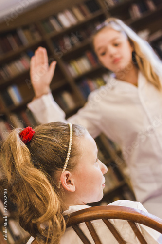 Obraz na plátně Bully swinging arm to slap little girl