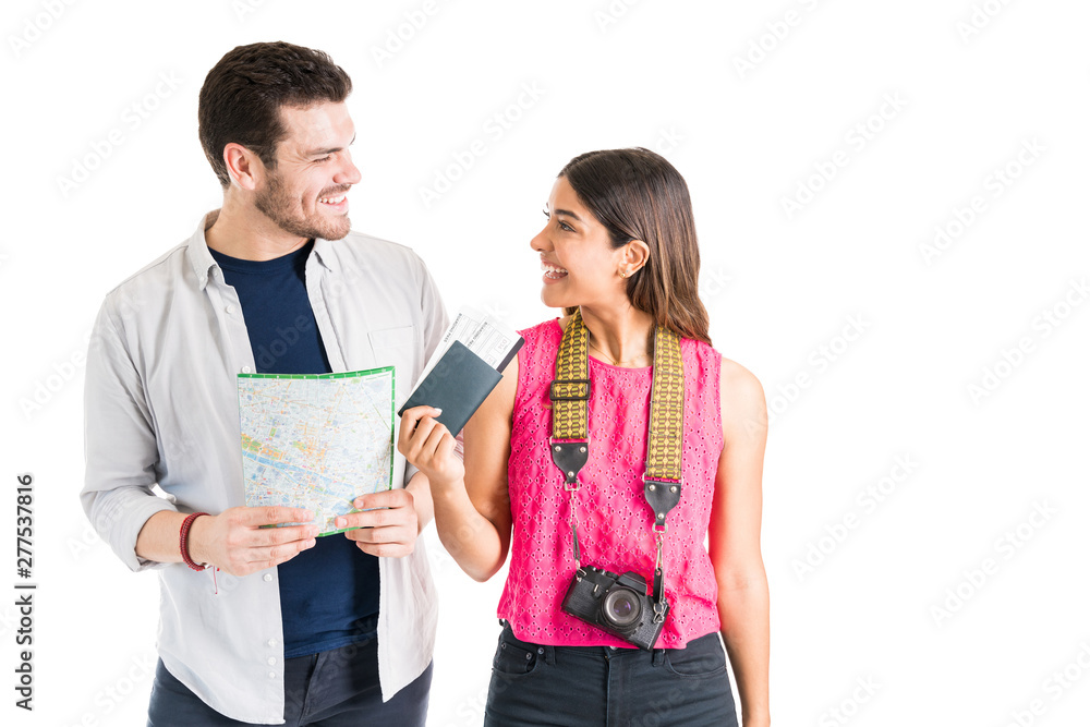 Couple Smiling While Going On Vacation Against White Background Couple Smiling While Going On Vacation Against White Background