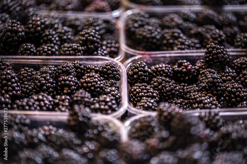 Display of fresh black berries at the weekend farmer's market