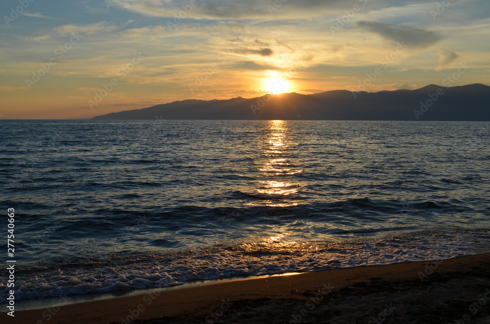 Fototapeta premium Enjoying the sunset from the beach.