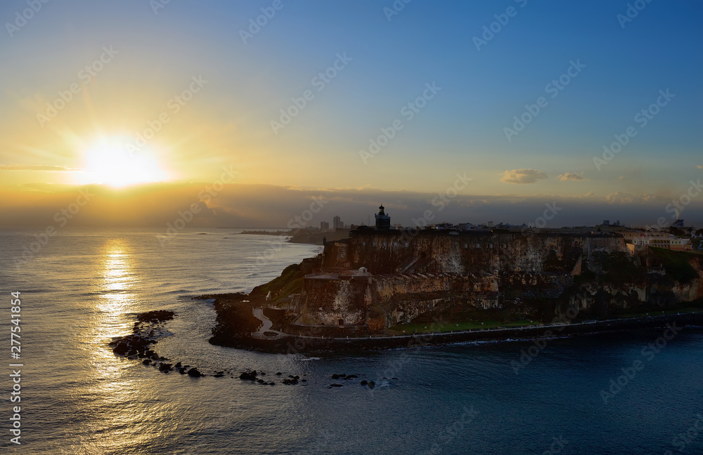 Coastline of San Juan, Puerto Rico and fortress the Castillo San Felipe del Morro on sunrise