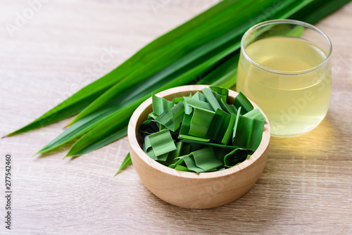 Sliced pandan leaf in a bowl and pandan drink, healthy drink in Asian photo