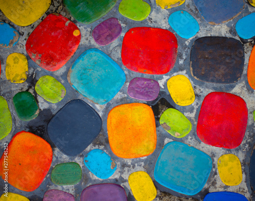 The surface is decorated with bright colors.