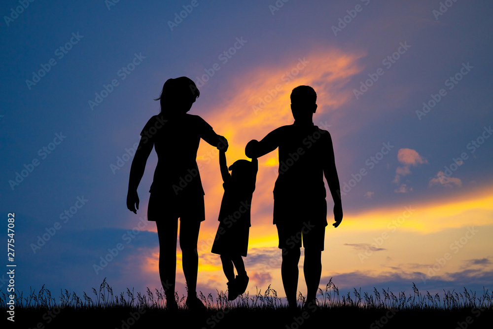 family game with child at sunset