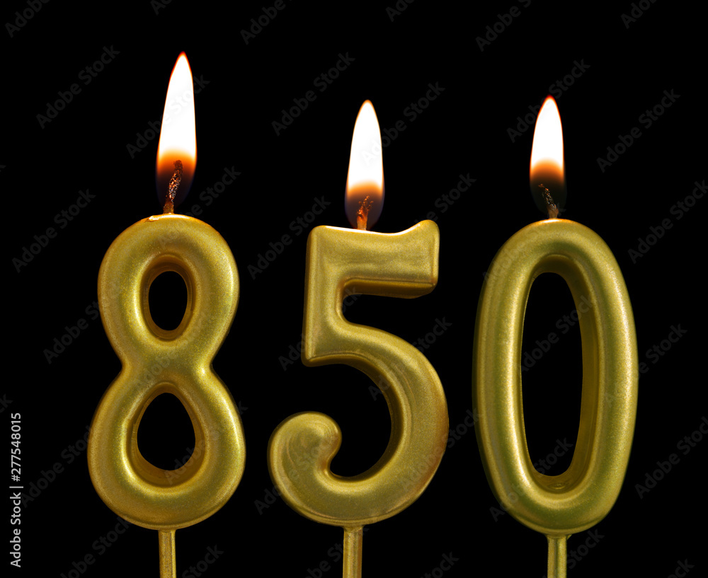 golden birthday candles on black background, number 850 golden birthday candles on black background, number 850