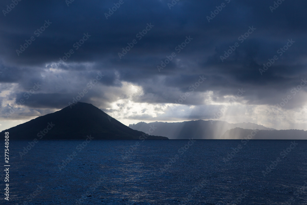 The majestic volcano of Gunung Api rises from the seascape in the Banda Islands of Indonesia. This region is also known as the Spice Islands where the worldwide spice trade was once centered. The majestic volcano of Gunung Api rises from the seascape in the Banda Islands of Indonesia. This region is also known as the Spice Islands where the worldwide spice trade was once centered.