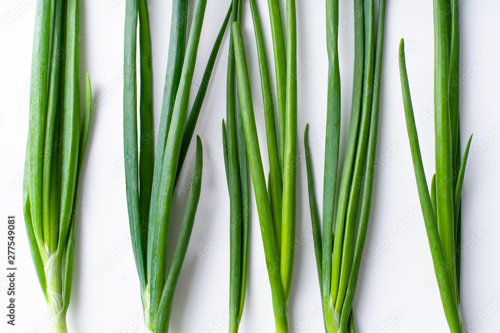 Fototapeta premium Flatlay with fresh green chives on white background