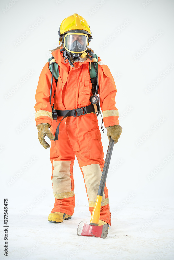 Firefighter holding axe with orange uniform on white background Firefighter holding axe with orange uniform on white background