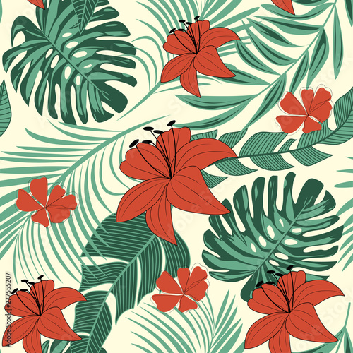 Trendy bright seamless background with colorful tropical leaves and flowers on pastel background. Vector design. Jungle print. Floral background. Printing and textiles. Exotic tropics. Fresh design.