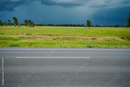 Side road and field background