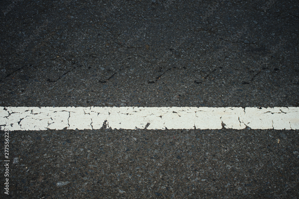 Fototapeta premium Road traffic paint White on the asphalt surface