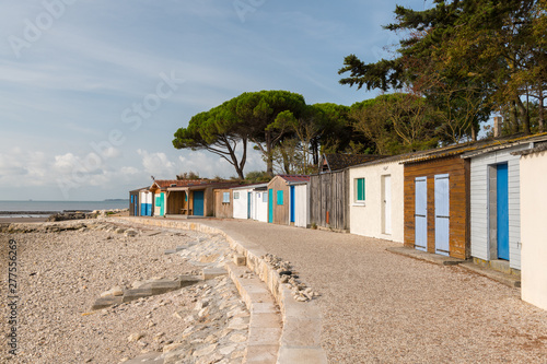 tiny colorful houses made of wood on the beach