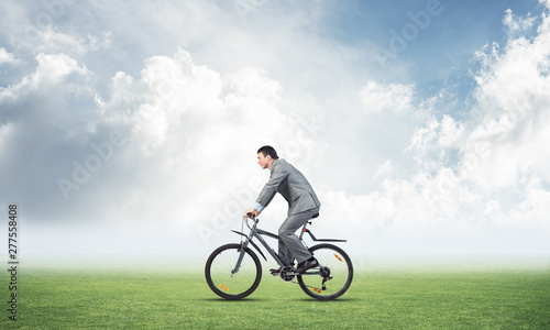 Businessman commuting to work by bike