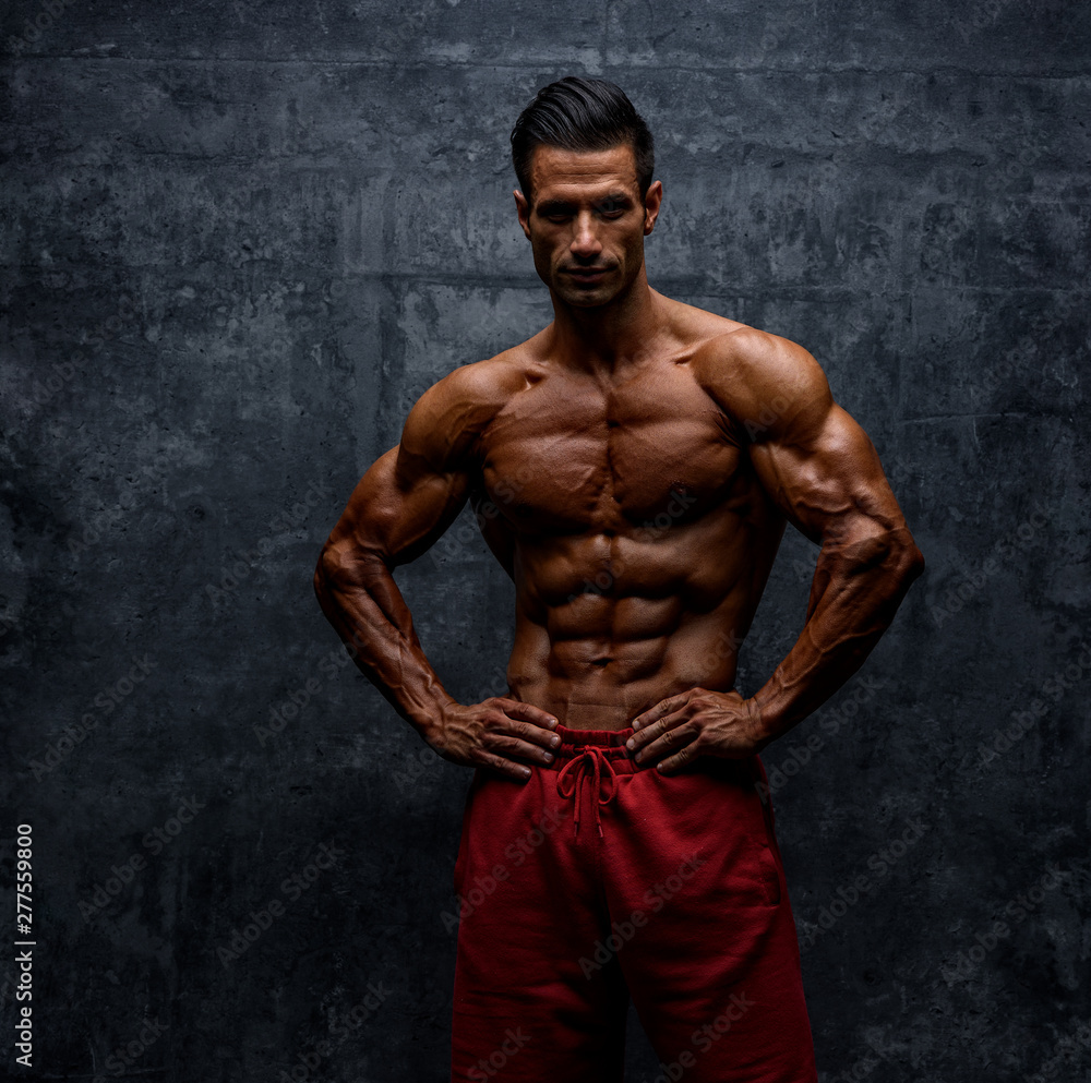 Handsome Muscular Men Posing and Flexing Muscles Handsome Muscular Men Posing and Flexing Muscles