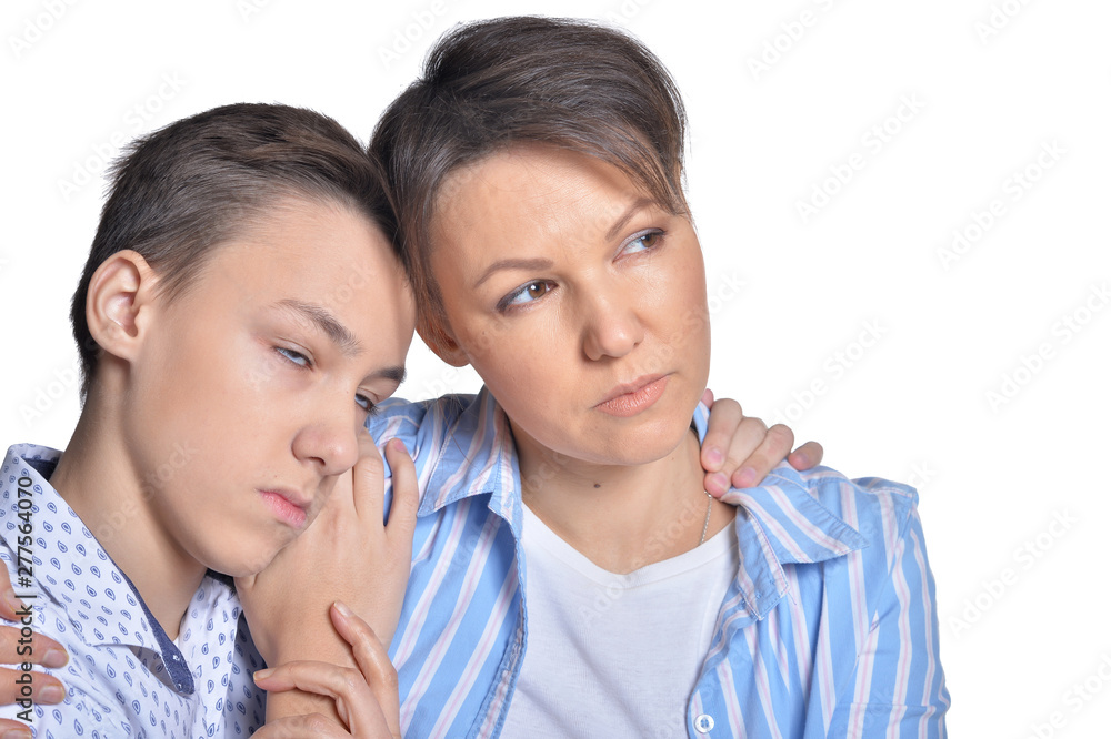 Sad family posing on a white background Sad family posing on a white background