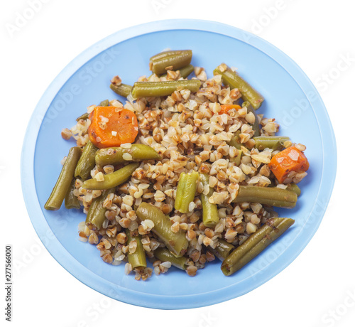 buckwheat with green beans with garlicand carrots isolated on white background. Diet breakfast on a plate.  food vegetarian top view photo