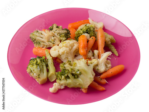 provencal vegetables on a plate.grilled vegetables on a plate isolated on white background.broccoli and carrots on a plate top view.healthy  food