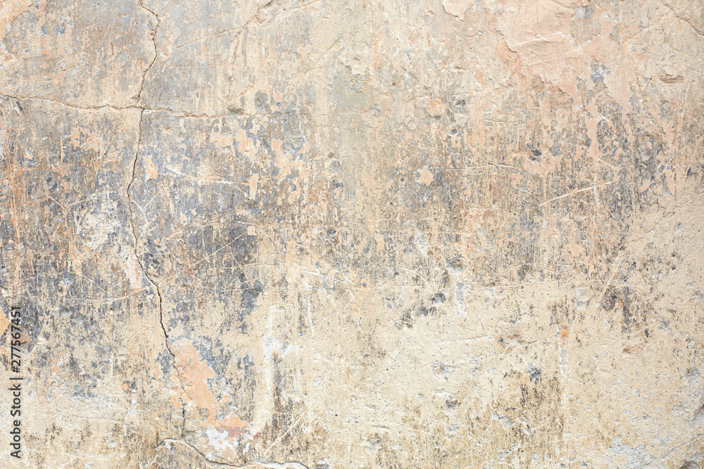 Old chipped and faded wall texture background in Italy