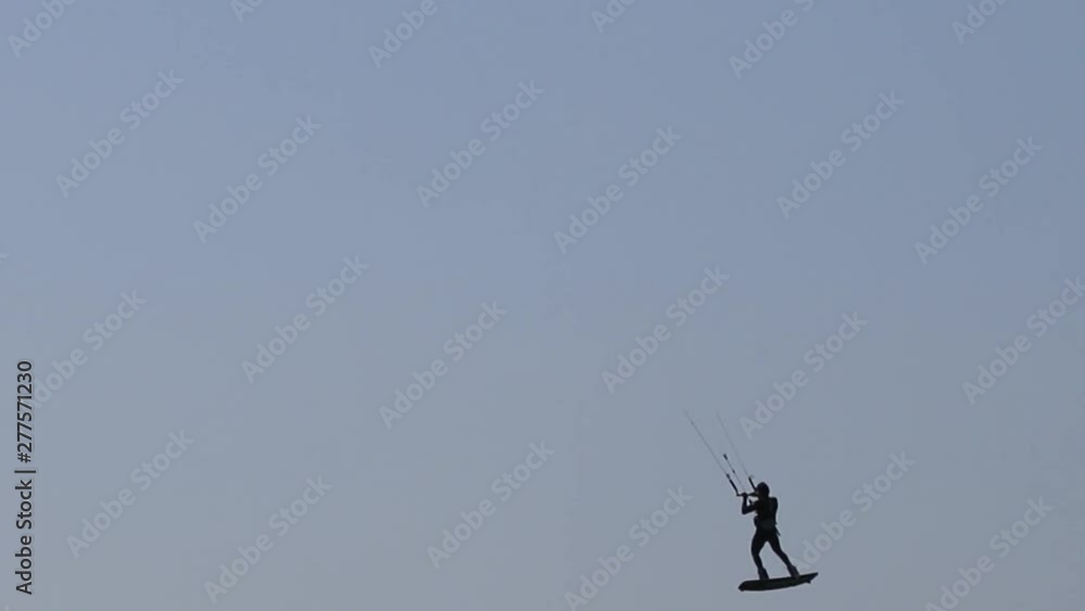 Kiteboarder jumping Kiteboarder jumping