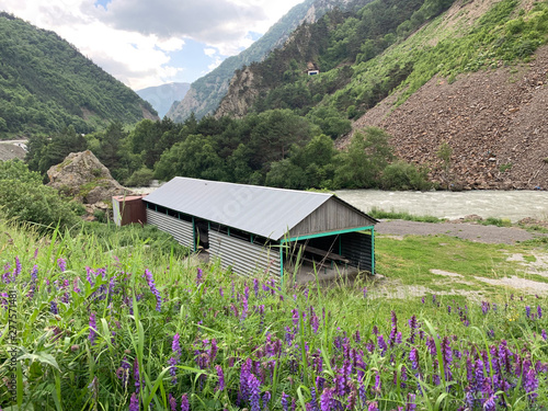Fototapeta Naklejka Na Ścianę i Meble -  Russia, North Ossetia. Recreation area on the banks of the river Ardon in the Kassar gorge in the summer at the entrance to the North Ossetian nature reserve