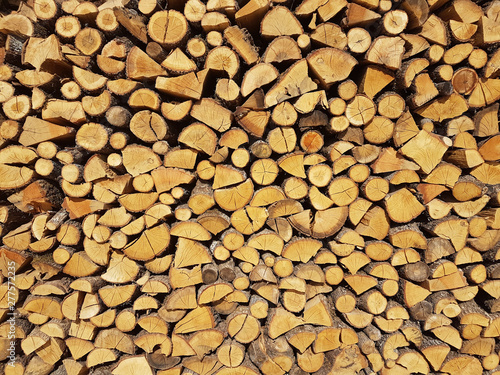 woods pile cut for fireplace stove many background