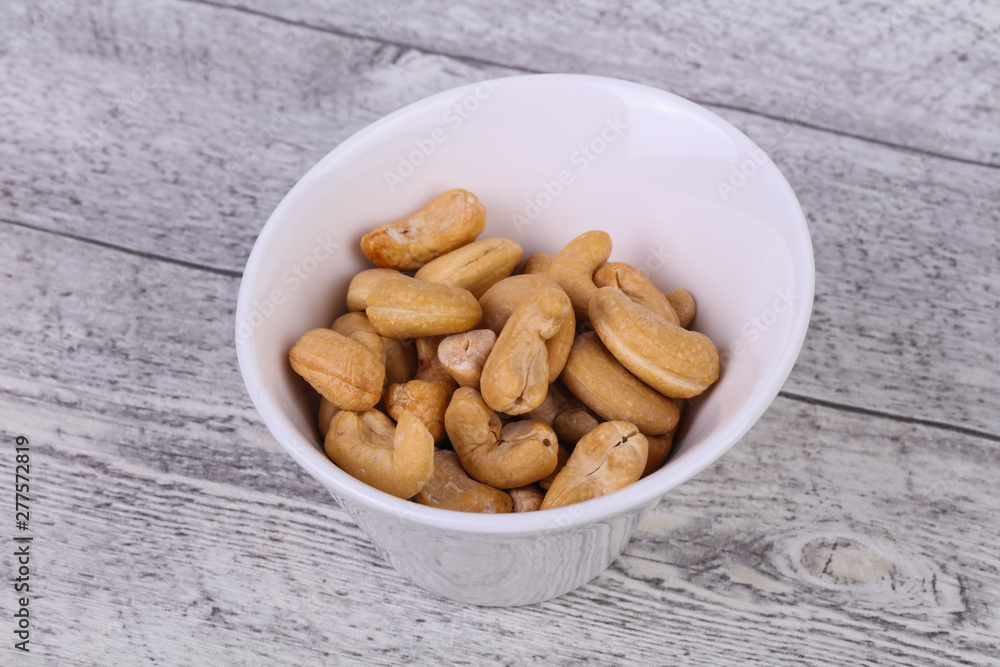 Cashew nuts heap in the bowl Cashew nuts heap in the bowl