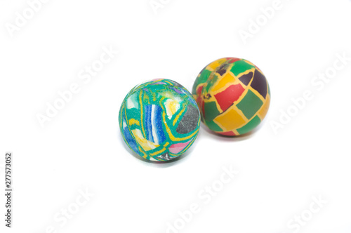 two small colorful Bouncing ball jumping,, isolated on white background - toy relax concept